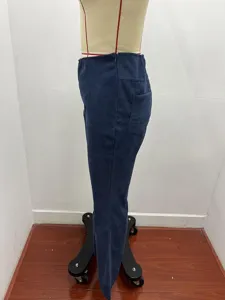 Side detail view of womens high waist corduroy flared trousers, casual slim fit design.