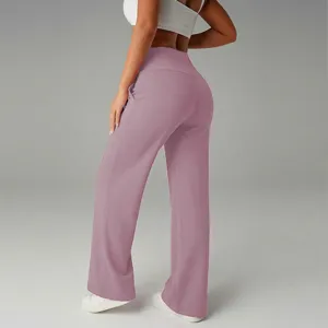 Pantalone casual a vita alta e gamba larga, vista dettagliata con tessuto elastico drappeggiato.