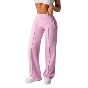 Pantaloni casual a gamba larga a vita alta rosa da donna con piega centrale e tasche laterali.