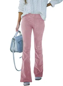 Detail shot of women high waist corduroy flare pants in solid pink, soft textured casual trousers.