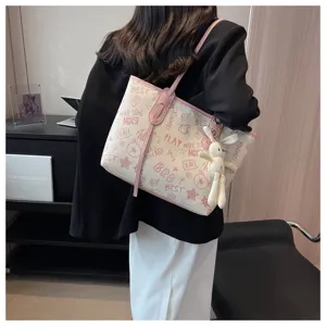 Stylish graffiti tote bag for women, casual canvas shoulder bag for daily commuting use.