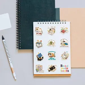 Cute cartoon cat and book stickers set, waterproof vinyl decals for laptop, luggage, and journal.