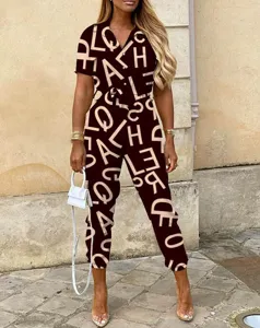 Damen Sommer Freizeit Revers Einreiher Gedruckt Jumpsuit mit Gürtel Mode Overall