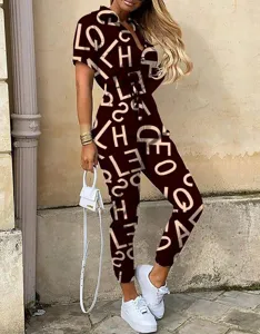 Damen Kurzarm Revers Knopf Jumpsuit mit Allover Buchdruck Lässige lange Hosen