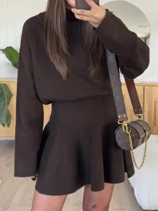 Women's autumn winter brown knit sweater and mini skirt two piece set casual stylish outfit.