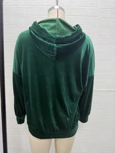 Back view detail of womens dark green velvet hoodie featuring long sleeves and a cozy hood.