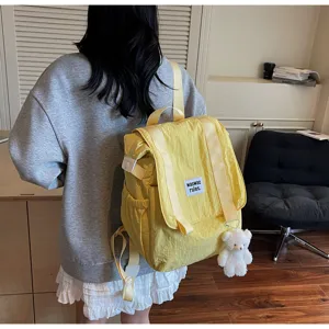 Casual large capacity nylon backpack for women, lightweight versatile school travel daypack.