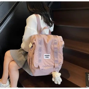 Casual large capacity nylon backpack for women, lightweight and versatile travel bag.