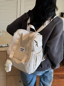 Casual large capacity nylon backpack for women, lightweight versatile outdoor travel daypack.
