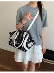 Black and white polka dot shoulder bag, large capacity stylish tote bag for daily commute.