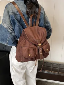 Sac à dos rétro en suédine marron pour femme, grand format voyage décontracté.
