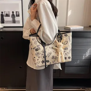 Large capacity casual graffiti tote bag for women, stylish summer shoulder shopping bag.