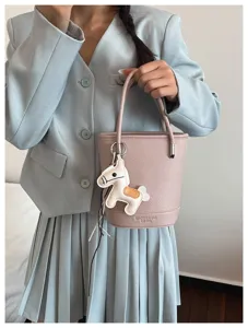 Elegant litchi grain bucket handbag featuring a charming leather horse pendant for women.