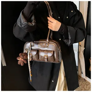 Vintage braune PU Leder Umhängetasche für Damen, retro Pendler Kissen Tasche mit Taschen.