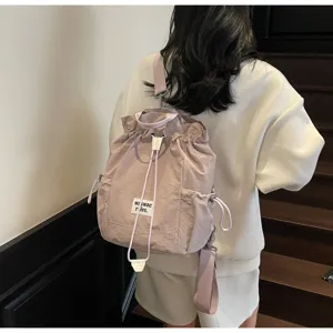 Casual canvas backpack for women, large capacity stylish school bookbag for travel and daily use.