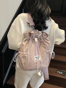 Casual canvas backpack for women, large capacity stylish school bag for daily travel use.