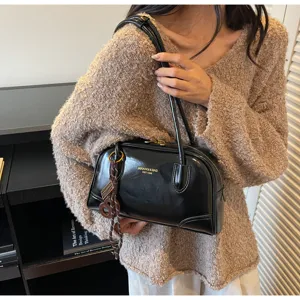 Black patent leather shoulder bag, trendy retro pillow bag for women daily commute autumn winter.