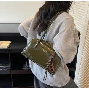 Women retro dark green glossy pillow shoulder bag casual commute autumn winter handbag.