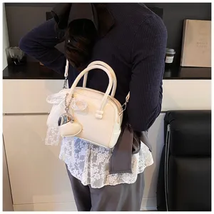 Spring lace bowling bag for women 2025 new trendy korean pillow handbag versatile crossbody