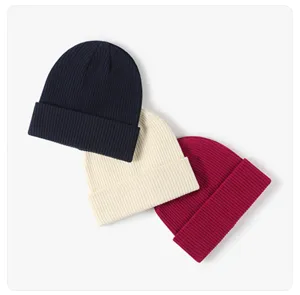 Detail shot of 3-color pure cotton knit beanies, soft ribbed warm winter hats in casual style.