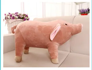 Detailed view of the cute simulation pig plush toy resting on a soft sofa, showing realistic.