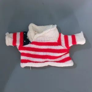 Detailed view of the red and white striped knit sweater for teddy bear dolls, soft textured winter outfit.
