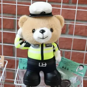 Detailed shot of the cute traffic police teddy bear plush toy wearing uniform and cap.