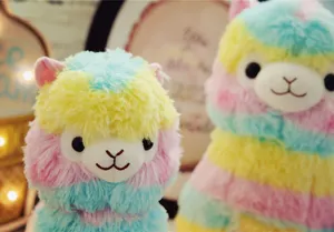 Detailed shot of cute rainbow alpaca plush toy, soft fluffy colorful striped doll.