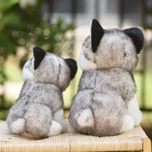 Simulation husky plush toy set, two cute fluffy stuffed animal dolls sitting outdoors nicely.