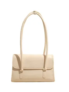 Minimalist PU leather shoulder underarm bag for women, stylish beige daily handbag.