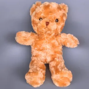 Cute brown teddy bear plush toy detail shot, soft fluffy fabric, perfect gift for kids.