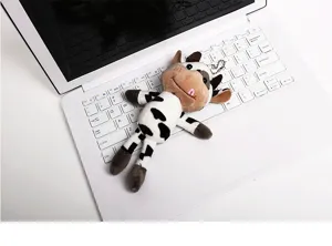 Cute cow plush toy keychain, soft stuffed animal bag pendant accessory for women and girls.