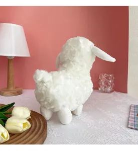 Close-up detail of the cute white lamb plush toy showcasing soft fluffy texture and design.