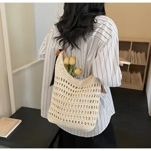 Witte holle geweven stro schoudertas voor dames, chique Franse stijl strand crossbody tas.