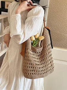 Chique Franse gehaakte schoudertas voor dames, holle stro strand tas stijl tas.