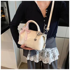 Stylish women pillow handbag with lace bow and shoulder strap, trendy fashion daily shoulder bag.