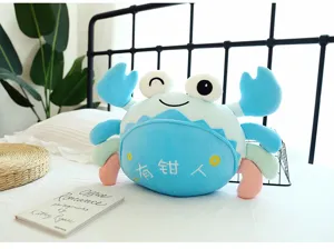 Cute blue crab plush toy detail view, soft stuffed animal doll with cute pincers expression.