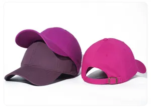 Gorra de béisbol de algodón puro lavado vista detallada, hebilla metálica ajustable y colores vivos.