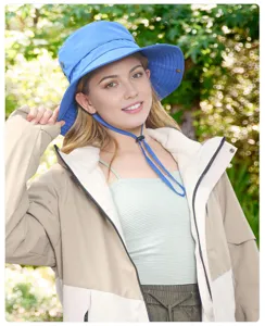 Outdoor sun protection bucket hat with adjustable drawstring and UV block for hiking travel.