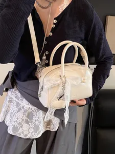 White bowling bag for women stylish PU leather handbag with elegant lace bow crossbody design.