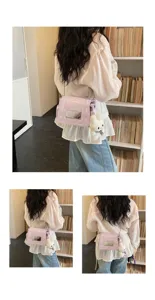 Detail view of light purple shoulder bag with chain strap and cute plush rabbit charm.