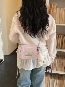 Chic purple women crossbody bag with chain strap and cute bunny pendant for daily commuting.