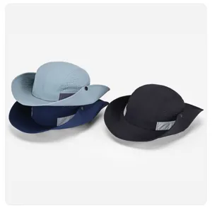 Detail view of lightweight breathable sun hats in light blue, dark blue, and black.