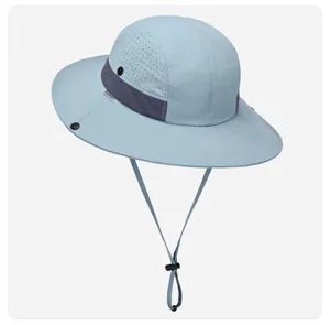Light blue breathable sun hat featuring laser-cut ventilation holes and adjustable chin strap.
