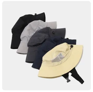 Detail view of multi-color breathable waterproof outdoor bucket hats with windproof cord.
