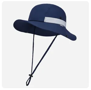 Close-up detail of breathable dark blue sun bucket hat with laser holes and adjustable chin cord.