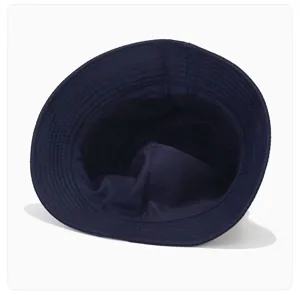 Classic navy blue cotton bucket hat detail view, premium casual sun protection headwear design.