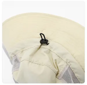 Close-up detail of outdoor breathable sun bucket hat with adjustable cord and mesh vents