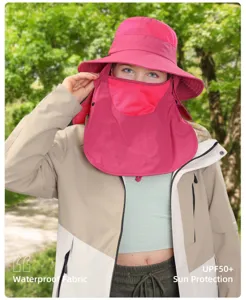 Detailed close-up of rose red sun hat with face mask and neck flap for outdoor sun protection.