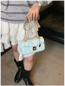 Light blue quilted chain shoulder bag, elegant cross-body small square bag for daily women.
